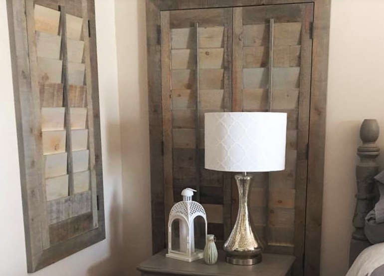 Dallas bedroom with repurposed wood shutters.